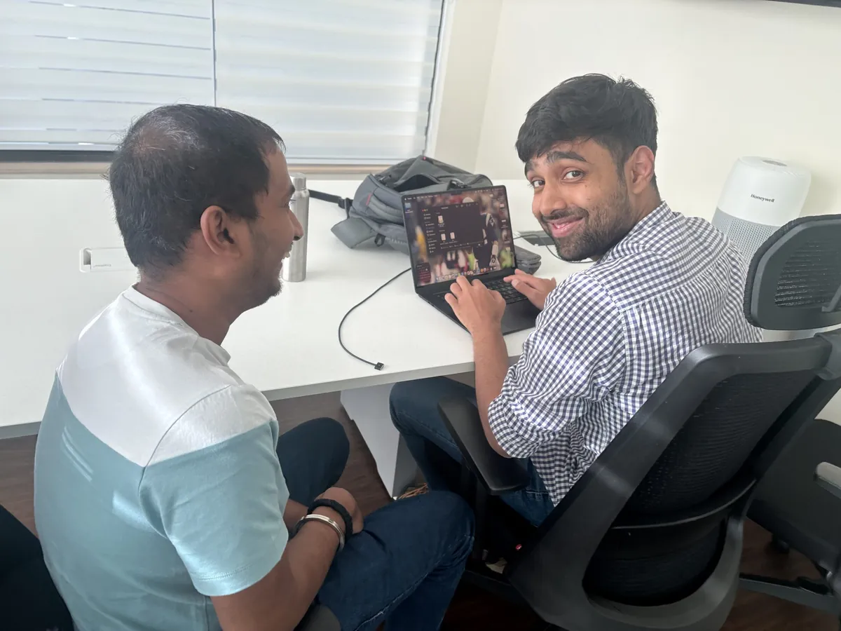 Two colleagues sharing a laugh